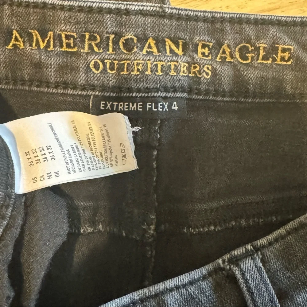 AMERICAN EAGLE Extreme Flex 4 Slim Jeans Black Ripped